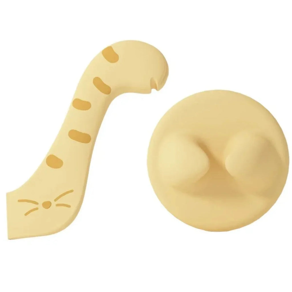Silicone pet food mixing spoon and flexible can sealing lids in grey, pink and yellow colours.