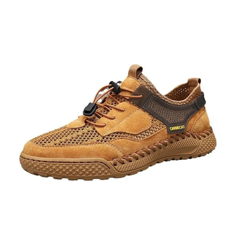 Men's brown suede low-top casual tennis shoes with a visible elastic band and hand-stitched rubber sole.
