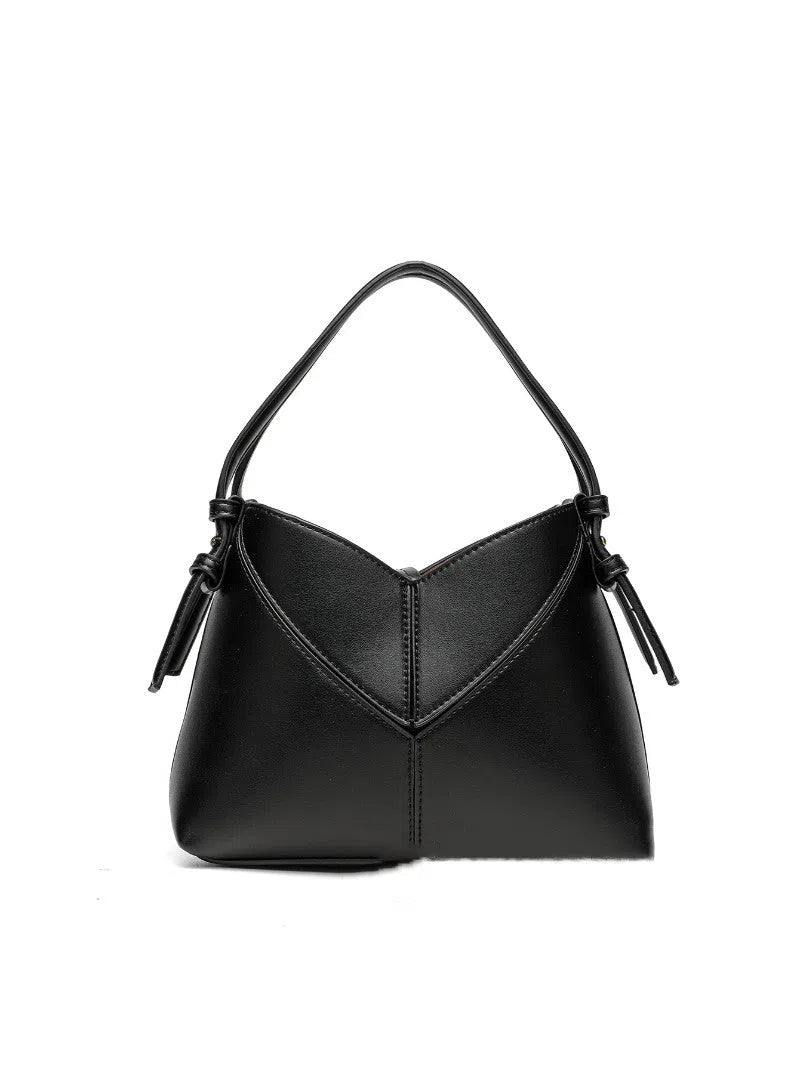 Women's oval PU handbag crossbody bag in black with stitched design and single shoulder strap