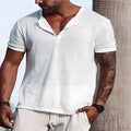 Casual short sleeve top with standing collar in white polyester, available in various sizes