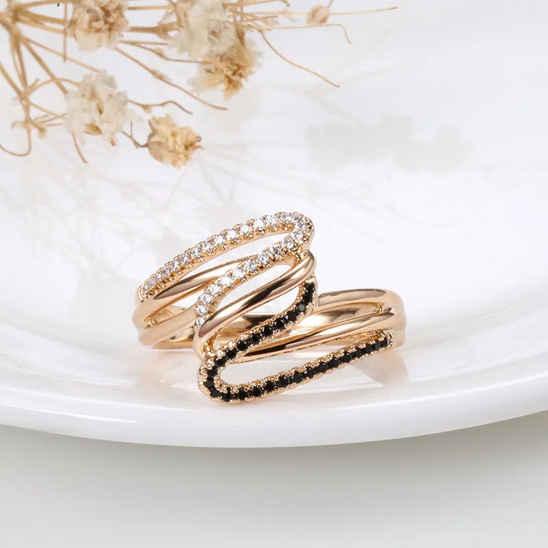 Close-up of a women's copper ring with micro-inlaid sparkling zircon stones in WK2230 colour.