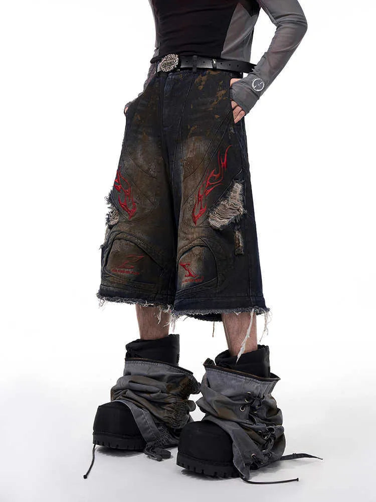 Men's retro jeans with detachable legs showing wide leg design and mid-high waist