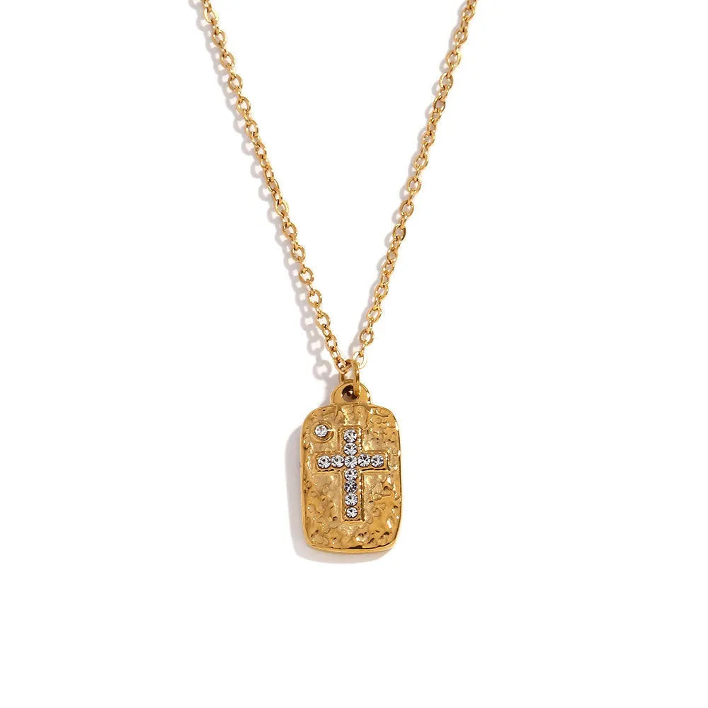 Gold micro inlay rhinestone cross hammer necklace on woman with quadrilateral geometric pendant on stainless steel chain
