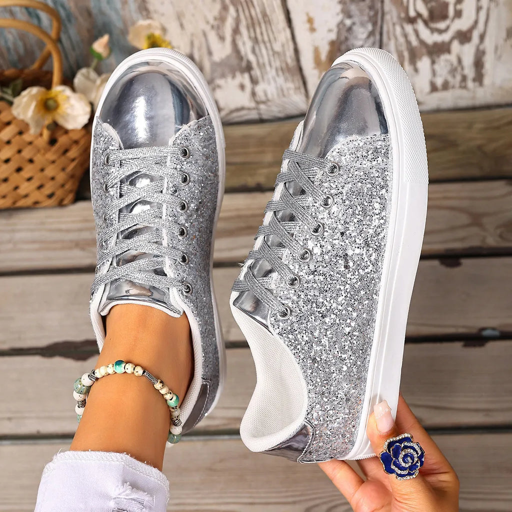 Women's black plus size board shoes with sequin detailing and white front lace-up fastening on a rubber sole.