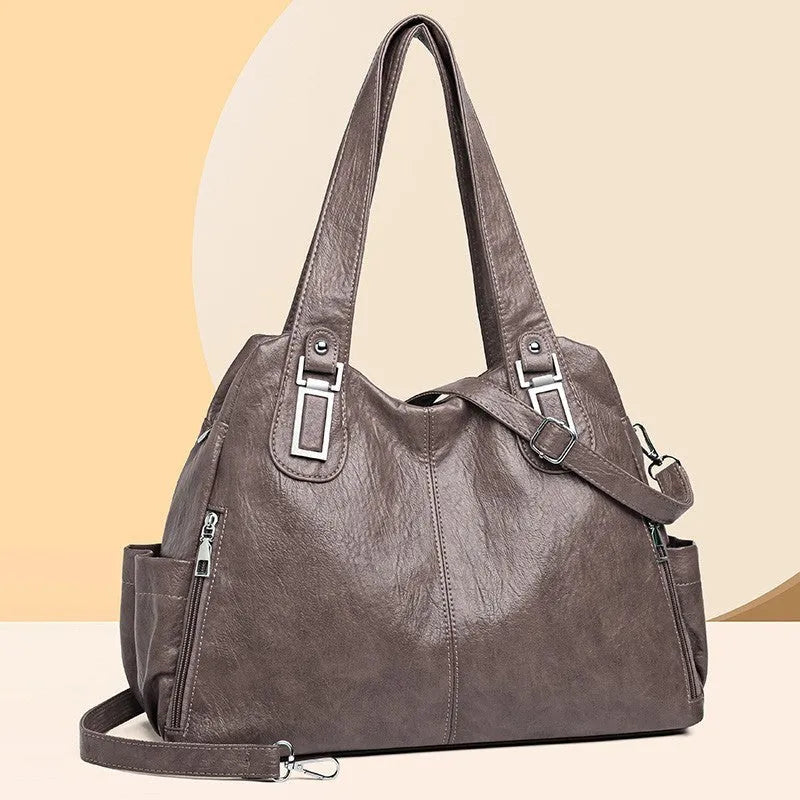 Soft PU leather women's tote bag in a square vertical shape with a single shoulder strap.