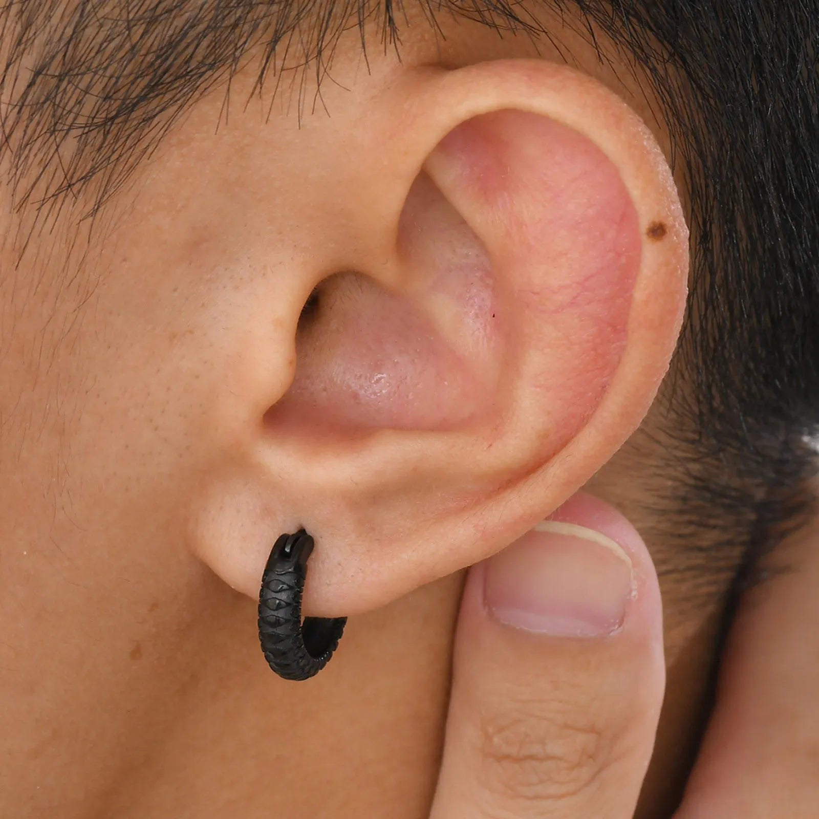 Stainless steel snake pattern earrings in black and gold finishes