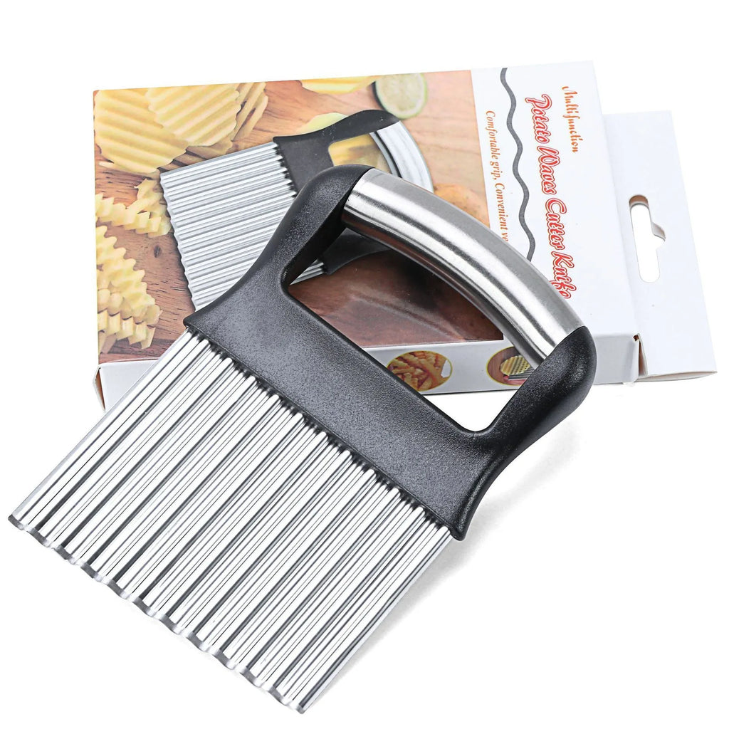 Stainless steel potato wave knife with wavy blade on a kitchen counter.