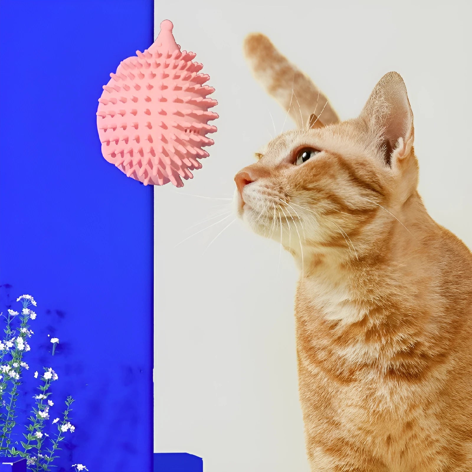 Green plastic cat corner scratcher with a cat teaser stick placed on a wooden floor