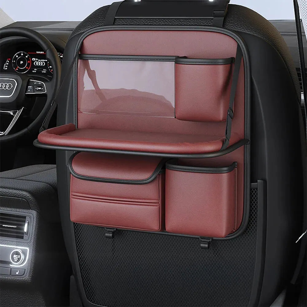 Leather car seat storage bag with carrying handle shown in black, hanging over a car seat.