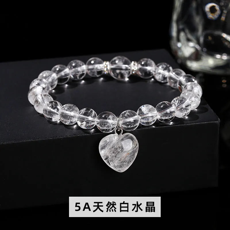 Handmade natural crystal bracelet with six stone types in geometric round beads, showing 8mm and 10mm purity size options