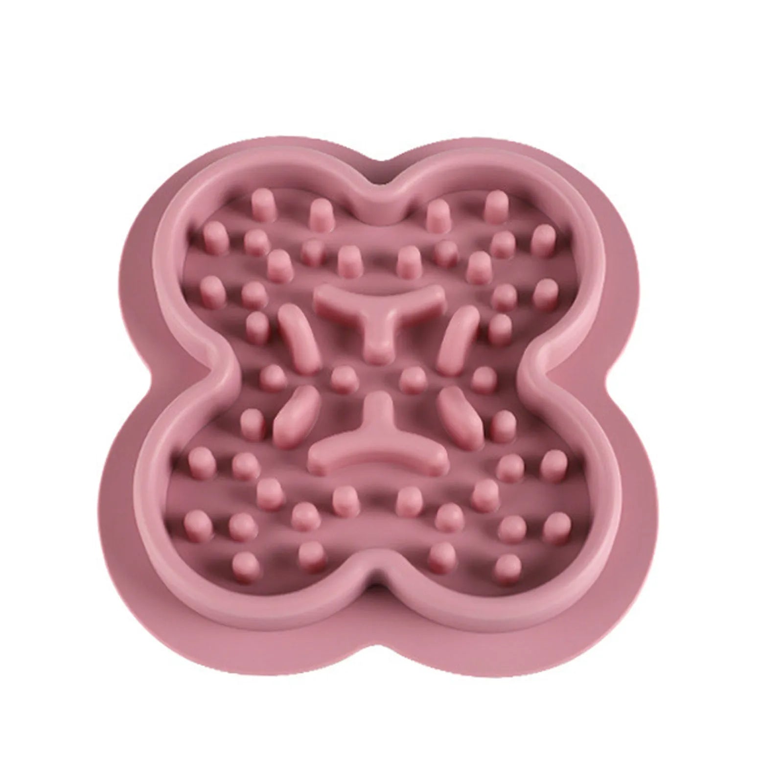 Silicone slow feeder licking pad for pets in various colours on a kitchen counter.