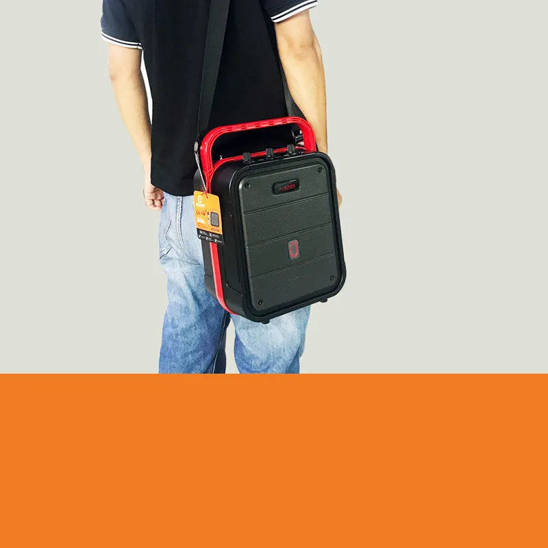 MS62AI portable Bluetooth speaker with wireless microphone showing plastic casing and control buttons