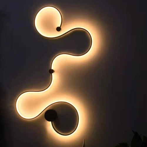Modern LED wall lamp with aluminium shade in black finish, wall-mounted design for bedroom or corridor lighting