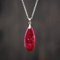 Jade water drop pendant on an 18K gold-plated chain, showing colour finish options.