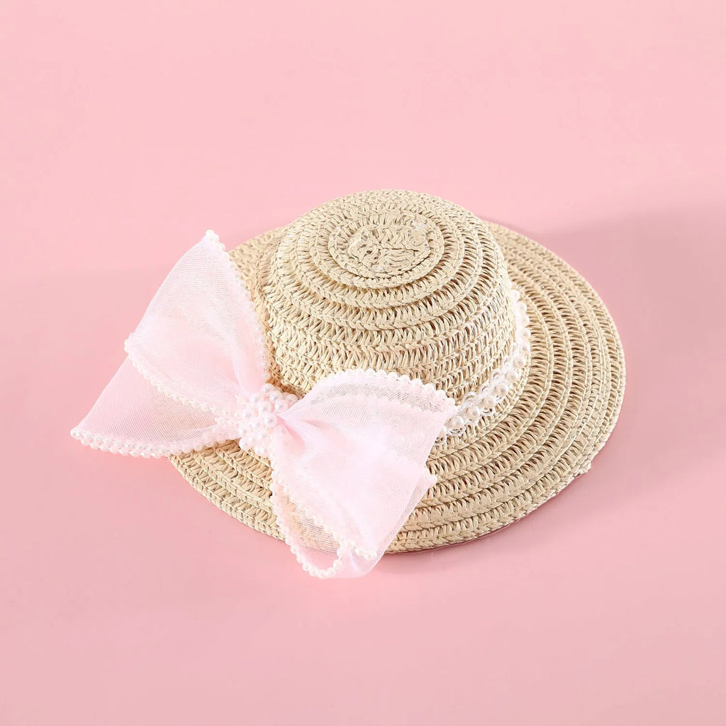 Woven straw cat hat with a pearl bow, shown in blue, pink, purple, and white colour options