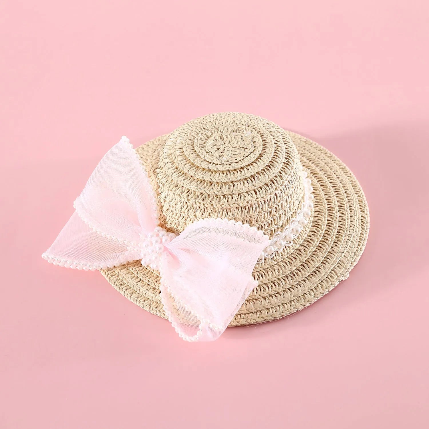 Woven straw cat hat with a pearl bow, shown in blue, pink, purple, and white colour options