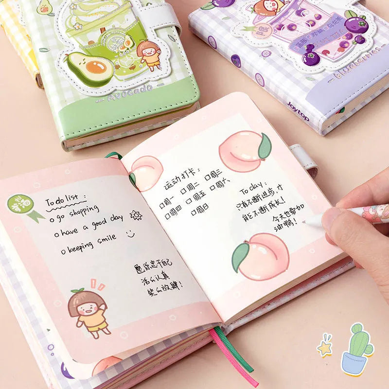 Cute magnetic buckle notebook with heart design, A6 size, in pink colour on a white background