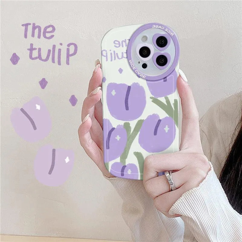 Purple transparent iPhone case with ring holder and tulip heart pattern, includes matching wrist strap