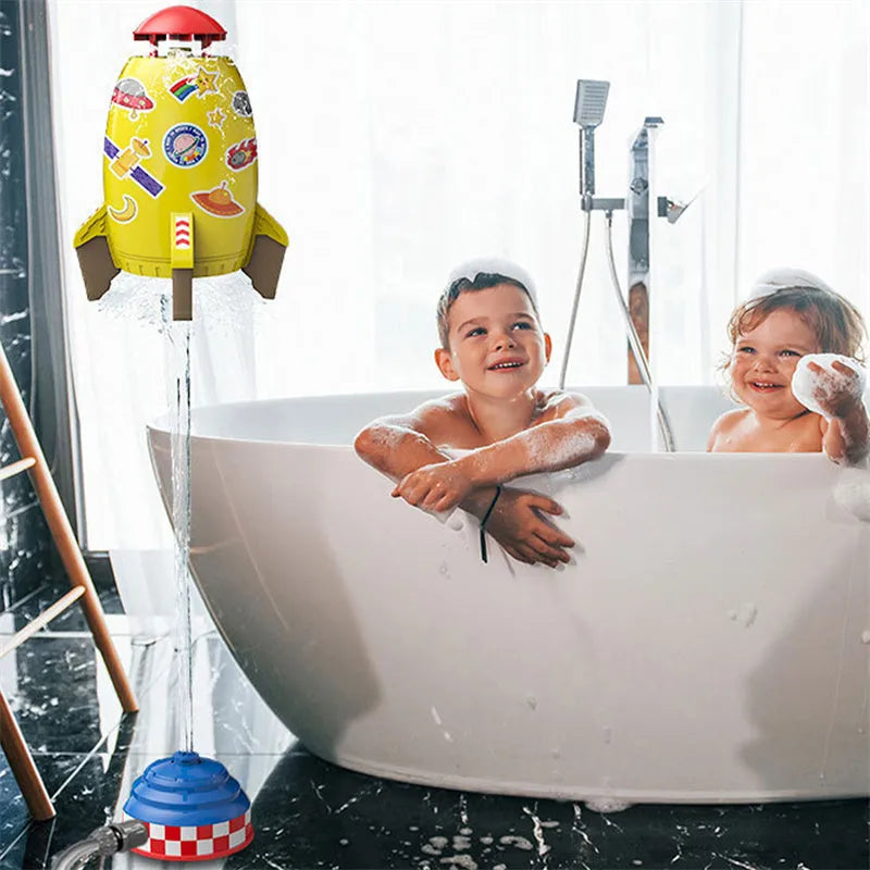 Water pressure powered rocket launcher toy with rotating sprinkler for outdoor garden use