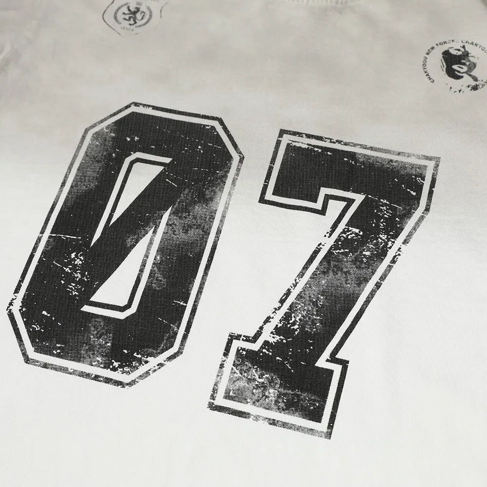 Men's black and white printed short-sleeved cotton T-shirt showing front design.