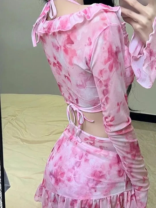Women's floral pattern bikini swimsuit in cherry blossom pink colour.