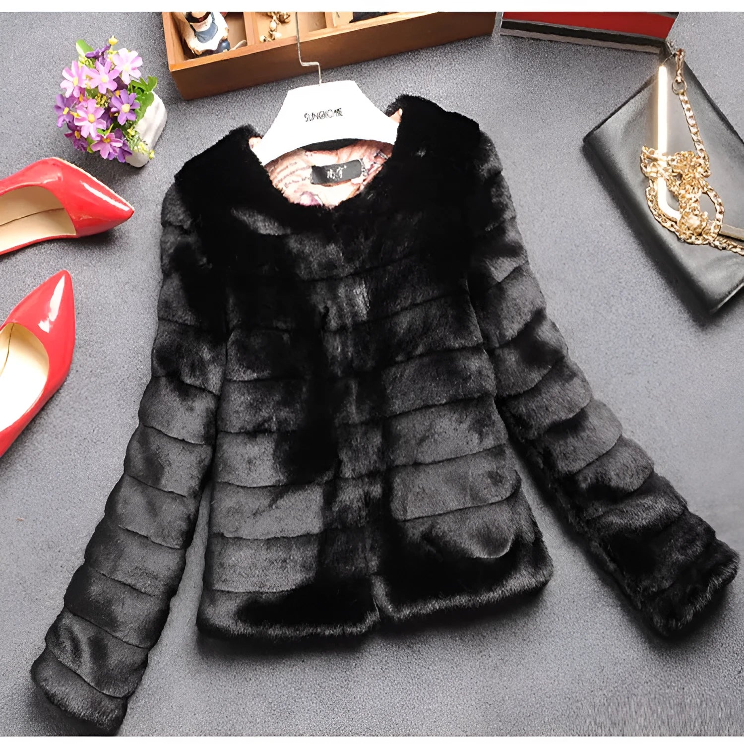 Woman wearing a short white faux fur top with regular sleeves, style suitable for street fashion.