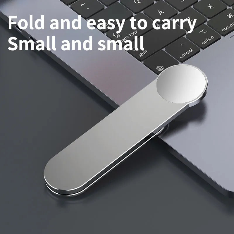 Silver aluminium alloy dual screen extension bracket holding mobile phone beside laptop