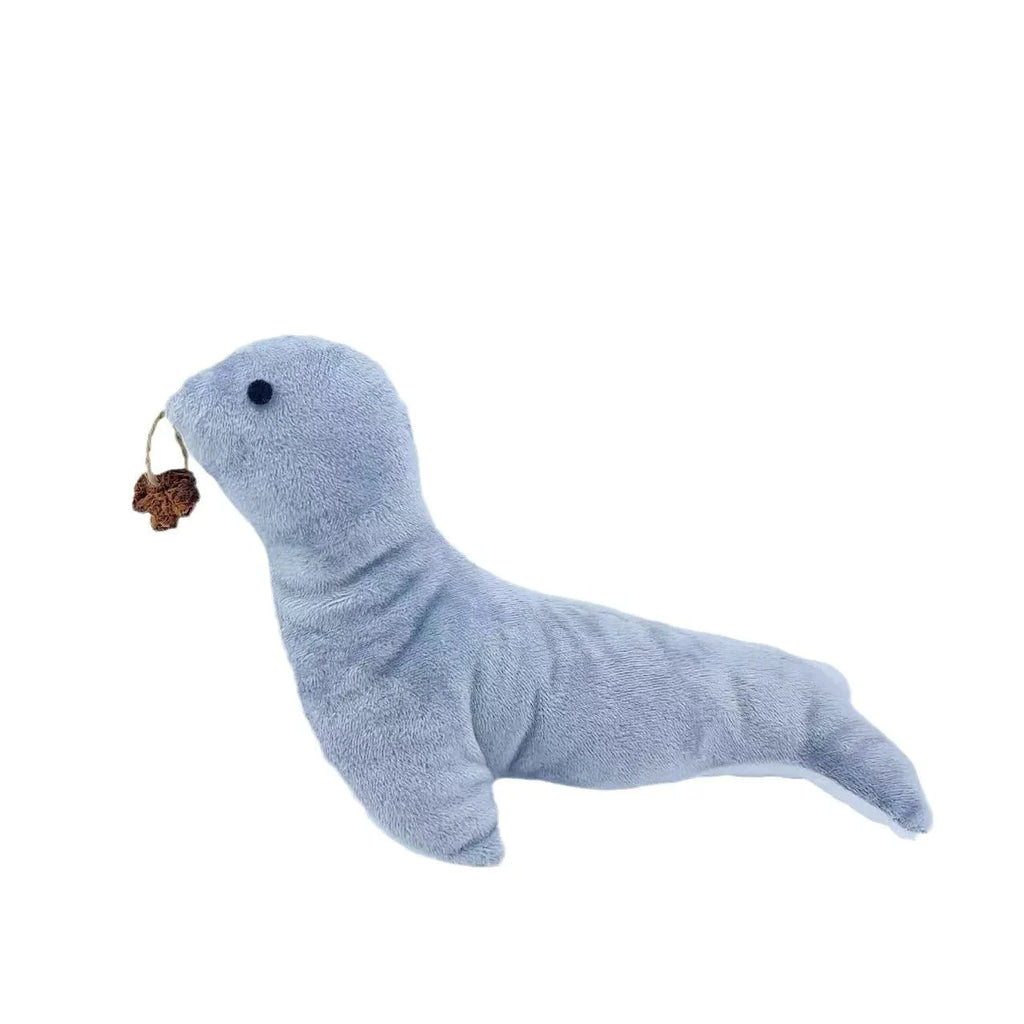 Blue sea lion shaped cat plush toy with bell sound feature and attached gall fruit teaser