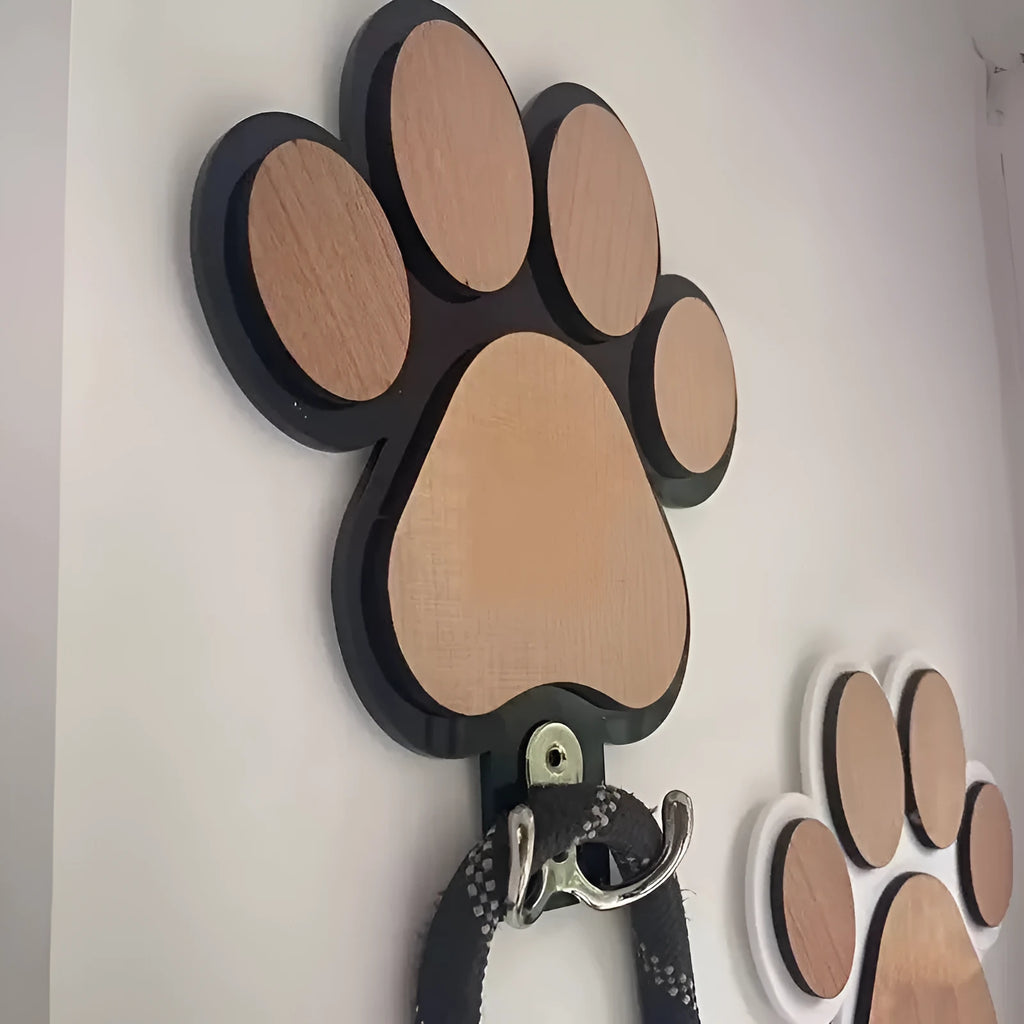 Black and white wooden paw print silhouette wall hook with 3-5kg load capacity for coats and keys