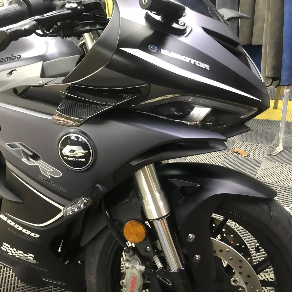 Universal motorcycle spoiler wing accessory measuring 18x8cm with four surface pattern options