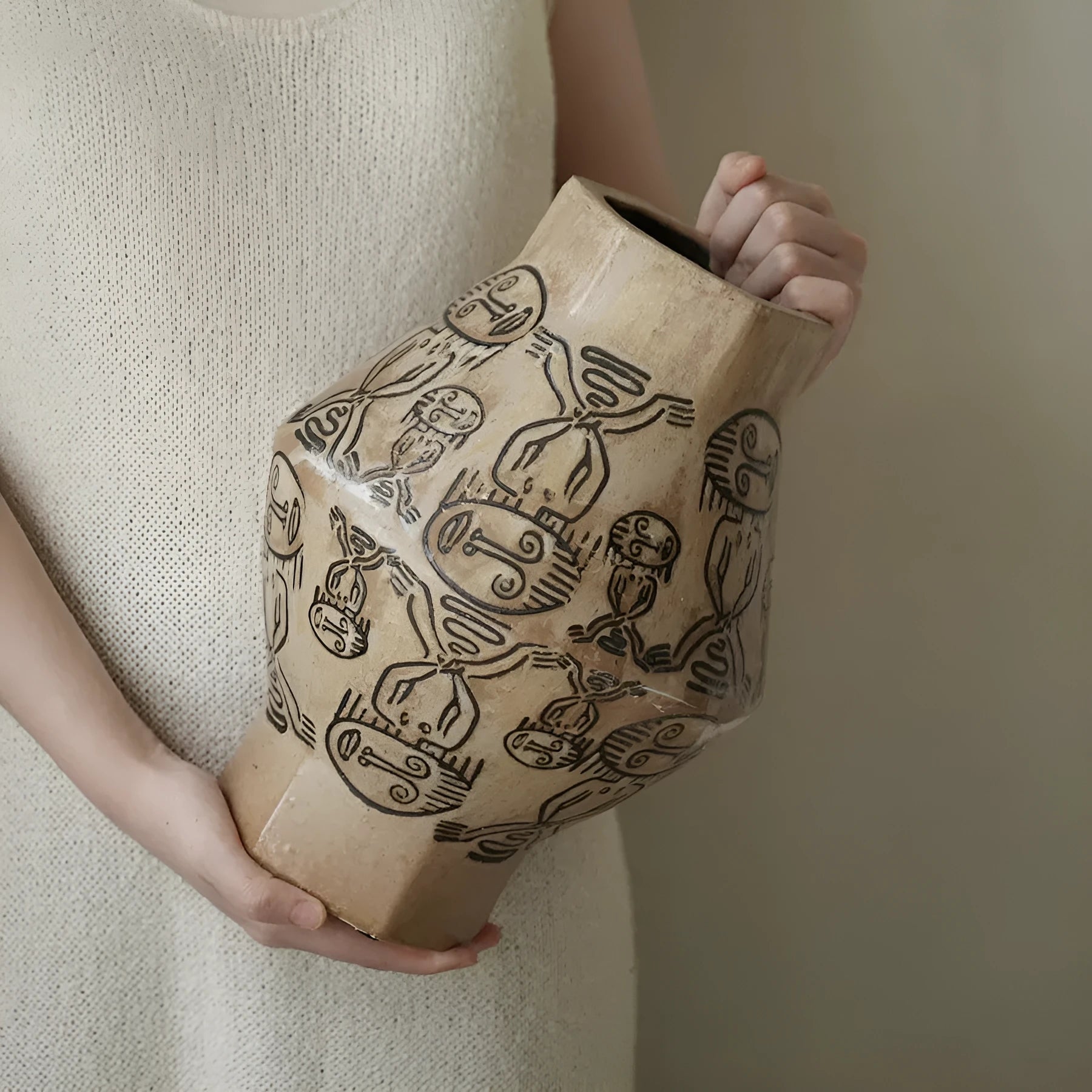 Ceramic cylindrical vase with hand-painted vintage carved tribal totem artwork