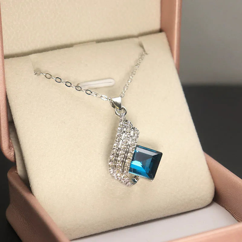 Glass pendant necklace and matching ear stud set with electroplated finish and cross chain style for women