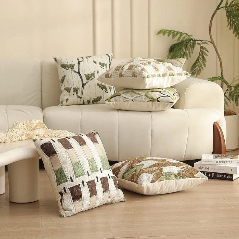 Close-up of a beige and green floral Jacquard woven cushion cover with textured pattern, 45cm square.