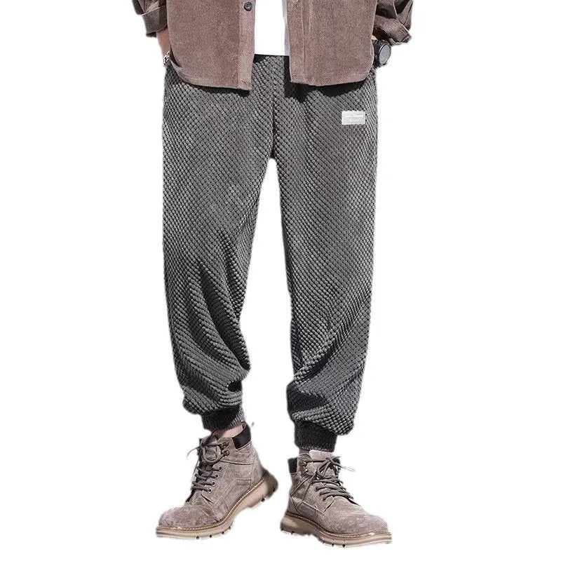 Men's grey ankle strap sweatpants with straight leg design and non-iron polyester blend fabric