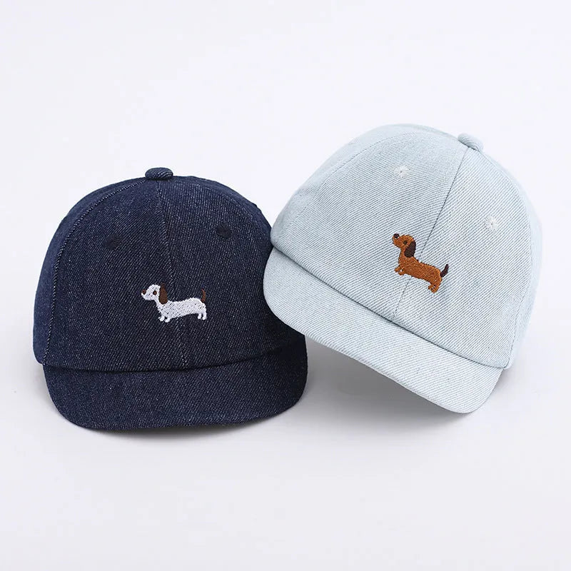 Denim puppy baseball cap for babies with 48cm head circumference in light blue