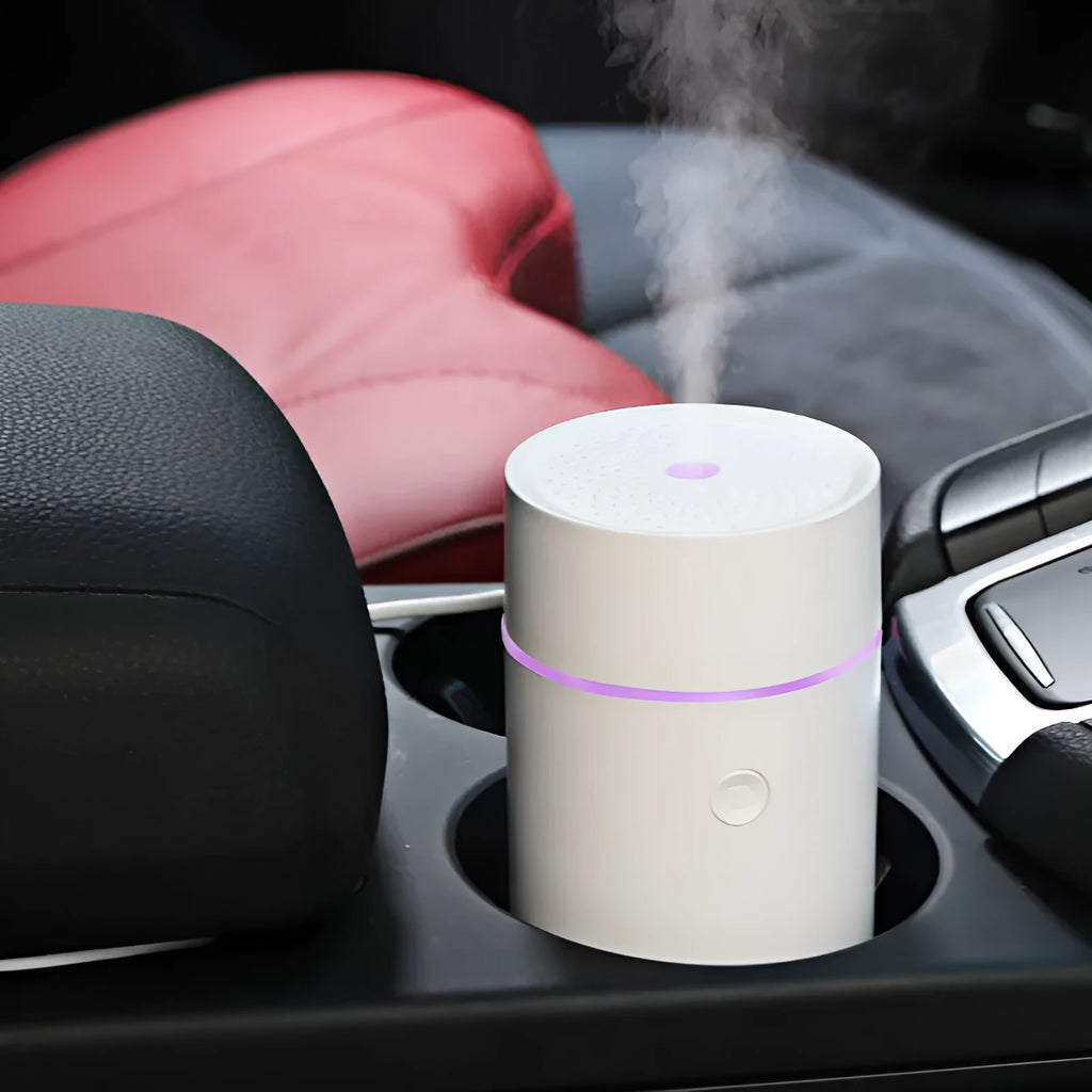 Mini USB aroma diffuser with ultrasonic mist and RGB LED lights in black finish for car or home use