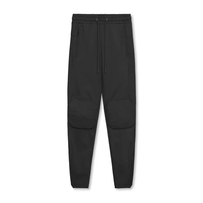 Men's loose grey running pants with ankle ties, quick-drying polyester fitness trousers for exercise