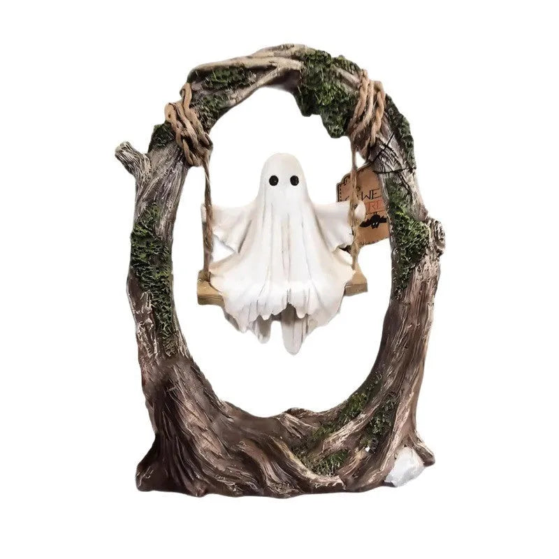 Modern Halloween decoration featuring a stylised white resin ghost on a black swing frame, with two design options shown.