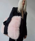 Large women's imitation fur shoulder bag in black, horizontal square shape with double straps and zipper closure