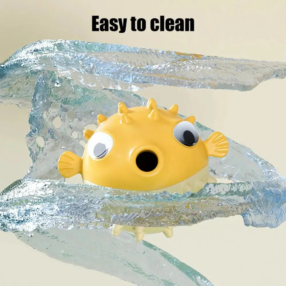 Yellow fish-shaped dog chew toy with textured surface and squeaker for aggressive chewers