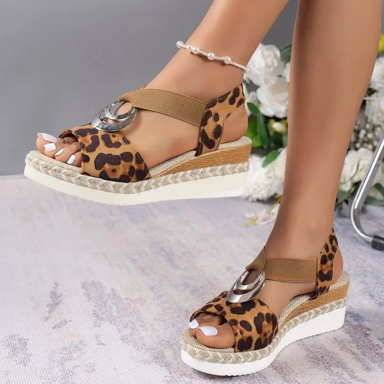 Platform wedge peep toe Roman sandals with sequin cloth upper and ankle buckle in black