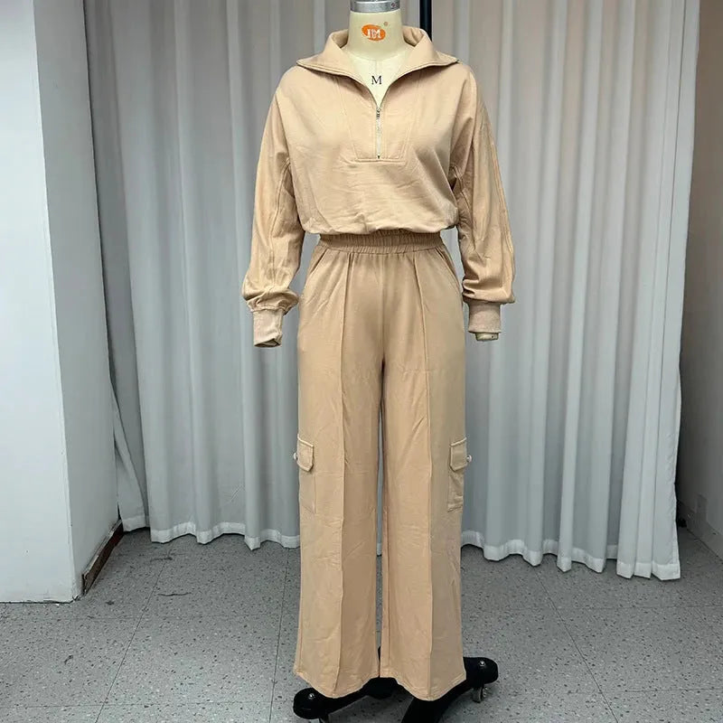 Women's light camel polyester lapel short sleeve top and wide leg trousers two-piece set on a hanger.