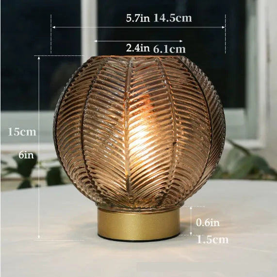 Wireless battery miniature decorative lamp with amber light in geometric stereo modern simplicity design on a tabletop