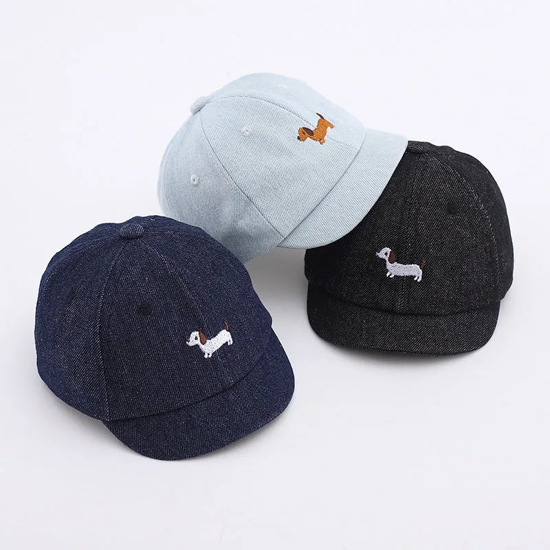 Denim puppy baseball cap for babies with 48cm head circumference in light blue