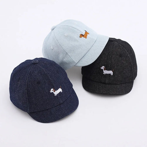 Denim puppy baseball cap for babies with 48cm head circumference in light blue