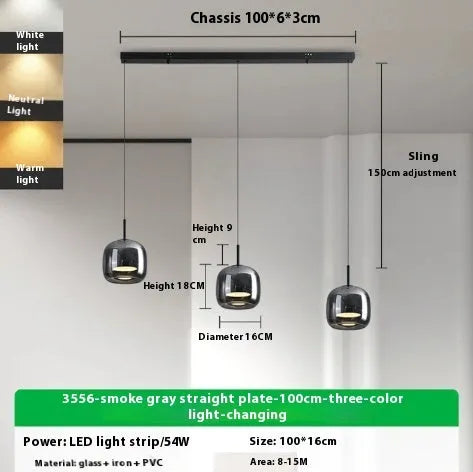 Italian minimalist glass chandelier with tricolor light in a dining room setting