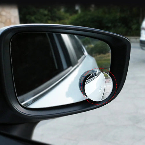 Silver round convex blind spot mirror with adjustable mount for car rearview mirror.