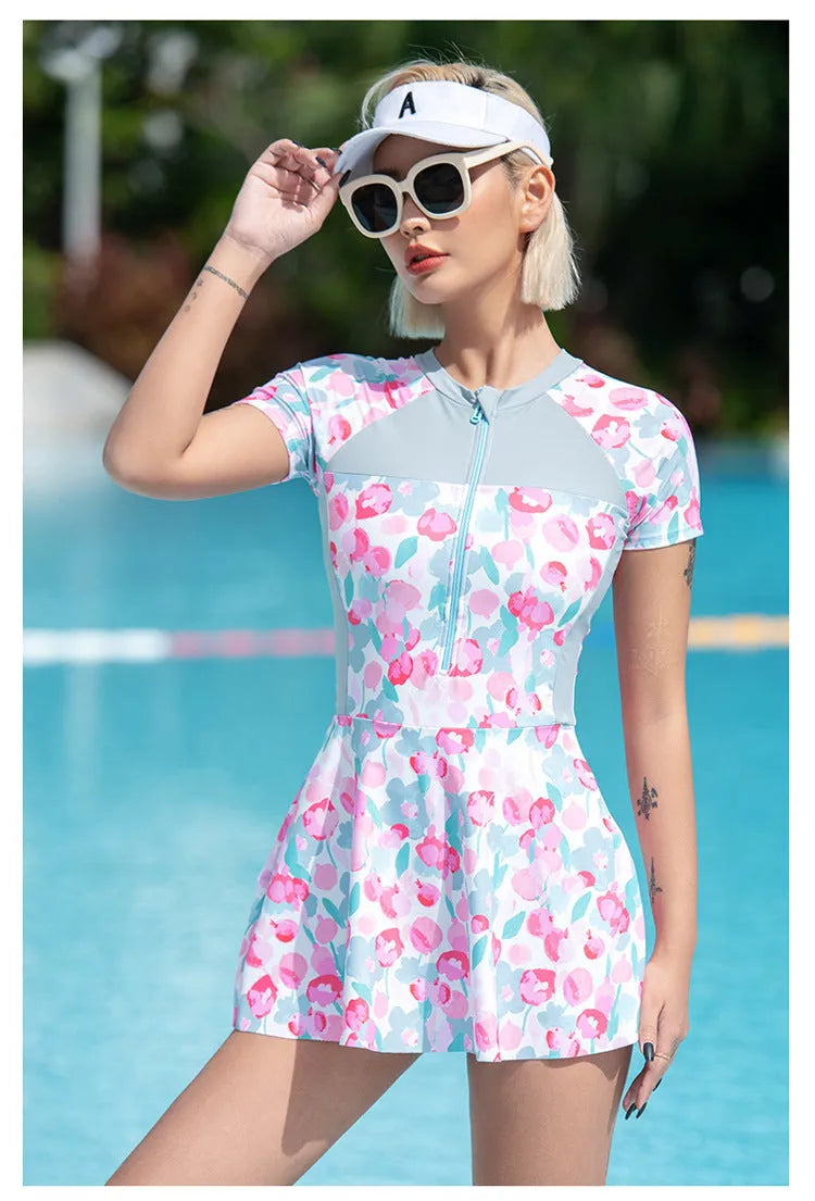 Plus size printed one-piece swimsuit for women in polyester fabric, sizes up to 3XL.