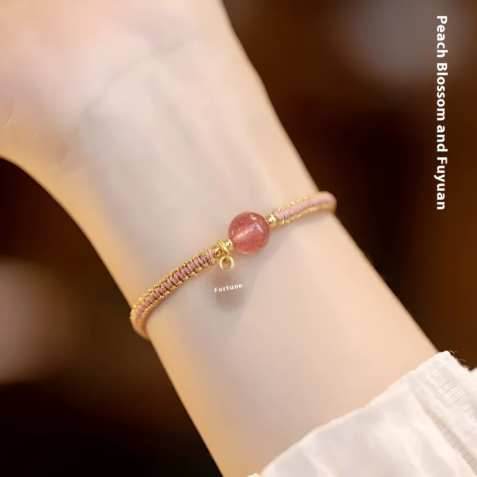Adjustable red rope bracelet with strawberry quartz gemstones in traditional Chinese style