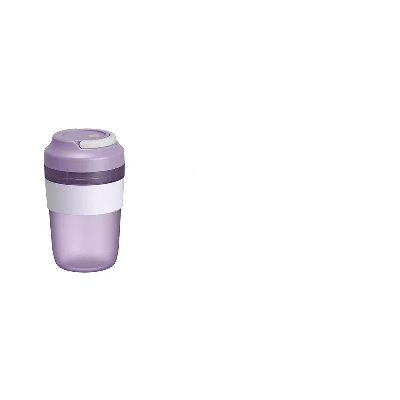 Grape purple portable rechargeable blender juicer cup with 400ml capacity and four stainless steel blades.